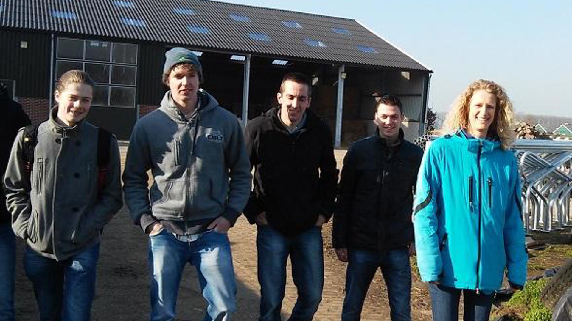 People walking at a farm